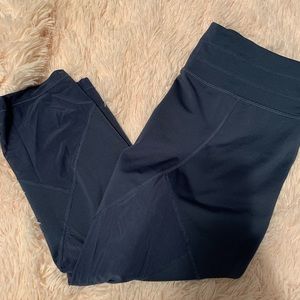Athleta navy sonar capris with mesh cutout